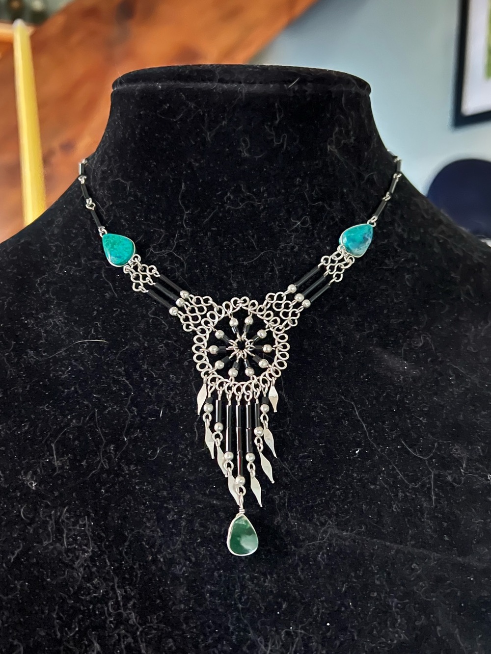 Southwestern dreamcatcher fringe Homer necklace teal and green stones.